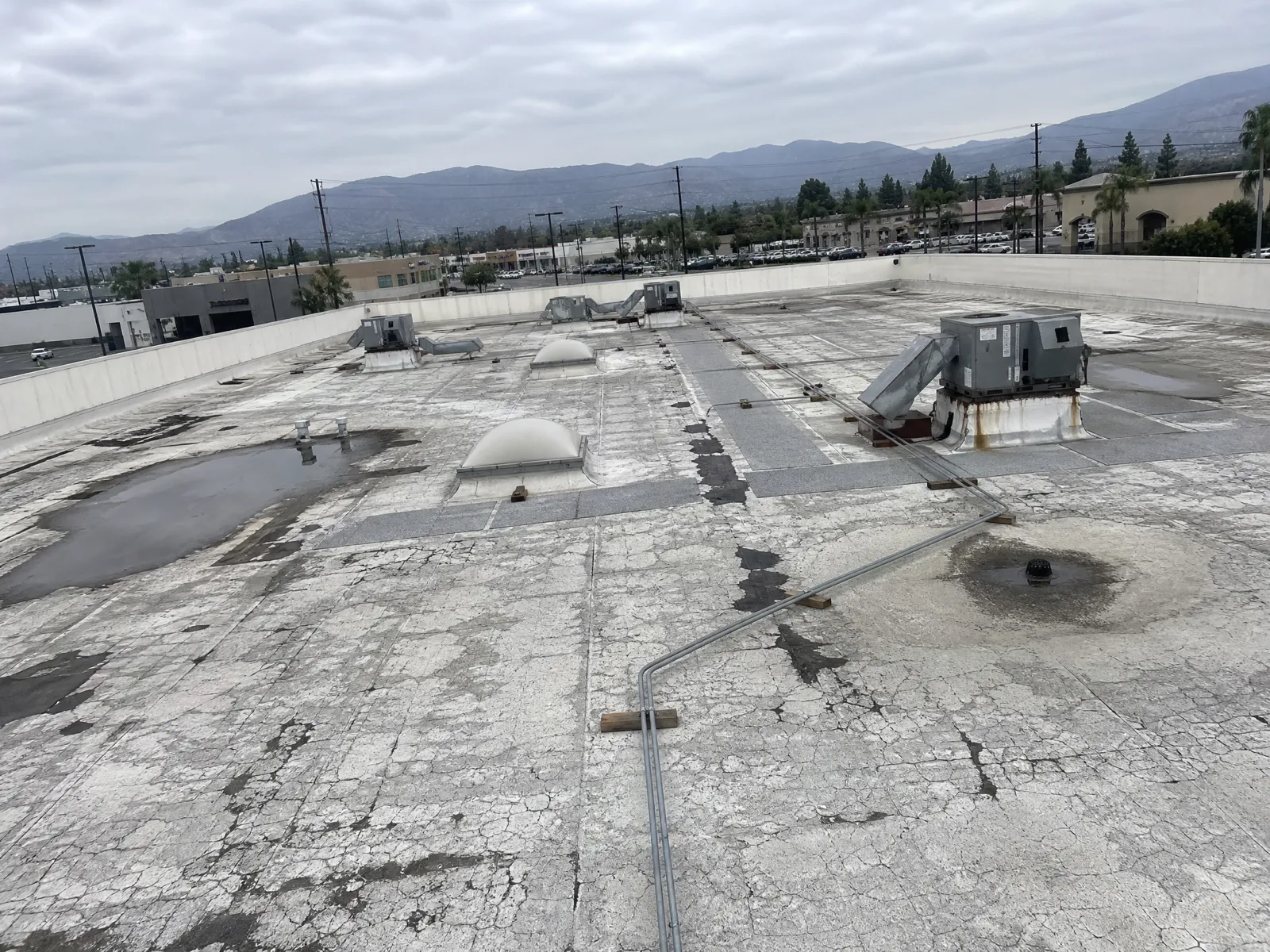 Failing commercial flat roof in Arcadia, CA before replacement